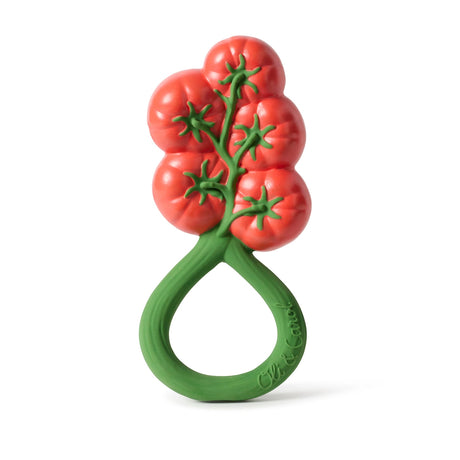 Natural rubber baby rattle shaped like a cluster of red tomatoes with a green handle ring for teething.