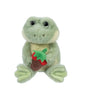 Soft green plush frog with big black eyes holding a chocolate strawberry shaped toy in front