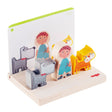 Wooden stacking toy with colorful farm animal and character pieces on a sturdy base, promoting creative play for children.