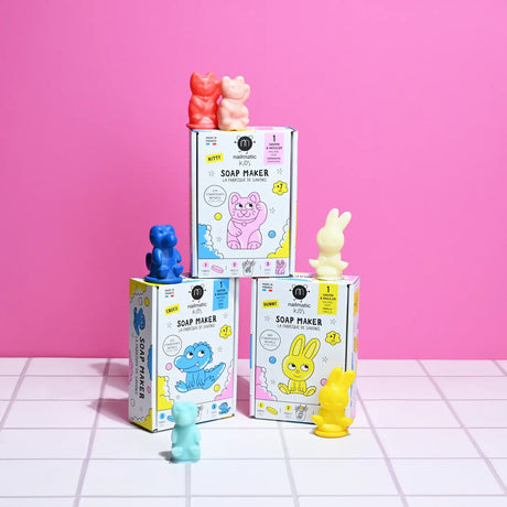 DIY Soap Maker Kitty with natural soap bars and animal-shaped molds for kids, including cat, rabbit, and crocodile designs.