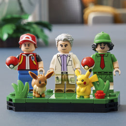 Pokemon Iconic Trainer Moments Poke Ball featuring trainers Pikachu and Eevee