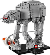 LEGO Star Wars model of an AT-AT walker with a Rebel snowspeeder wrapping a tow cable around its leg on a display stand