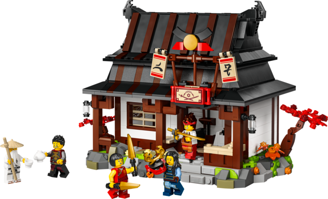 Ninjago blacksmith shop building set with detailed forge, bedroom interior, and four minifigures posed around the model.