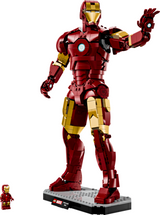 Poseable Iron Man Mark 3 LEGO figure in red and gold armor standing on a display base with raised arm gesture