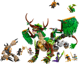 Posable green dragon toy with spread wings and saddle surrounded by multiple small adventure figures and creatures