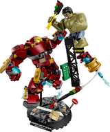 LEGO Marvel Hulkbuster mech battles Hulk figure on a detailed urban base with road signs and debris elements