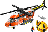 Bright orange sea rescue helicopter toy with minifigures, rescue capsule, and shark figure for imaginative play.