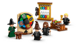 LEGO Harry Potter set showing Sorting Hat ceremony with minifigures, colorful house wheel, and accessories on table