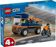 Toy flatbed truck with two orange motorcycles and two driver minifigures for creative play on race track background