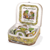Open Frog and Toad tin picnic set for two with plates, cups, and utensils featuring charming character illustrations