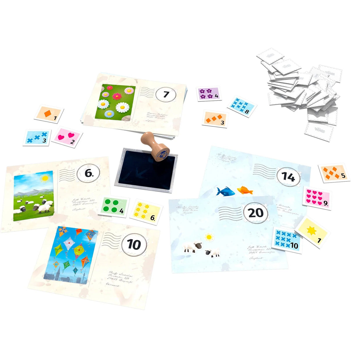 Colorful postcards and numbered stamp tiles arranged for Pio's Pigeon Post math game play session
