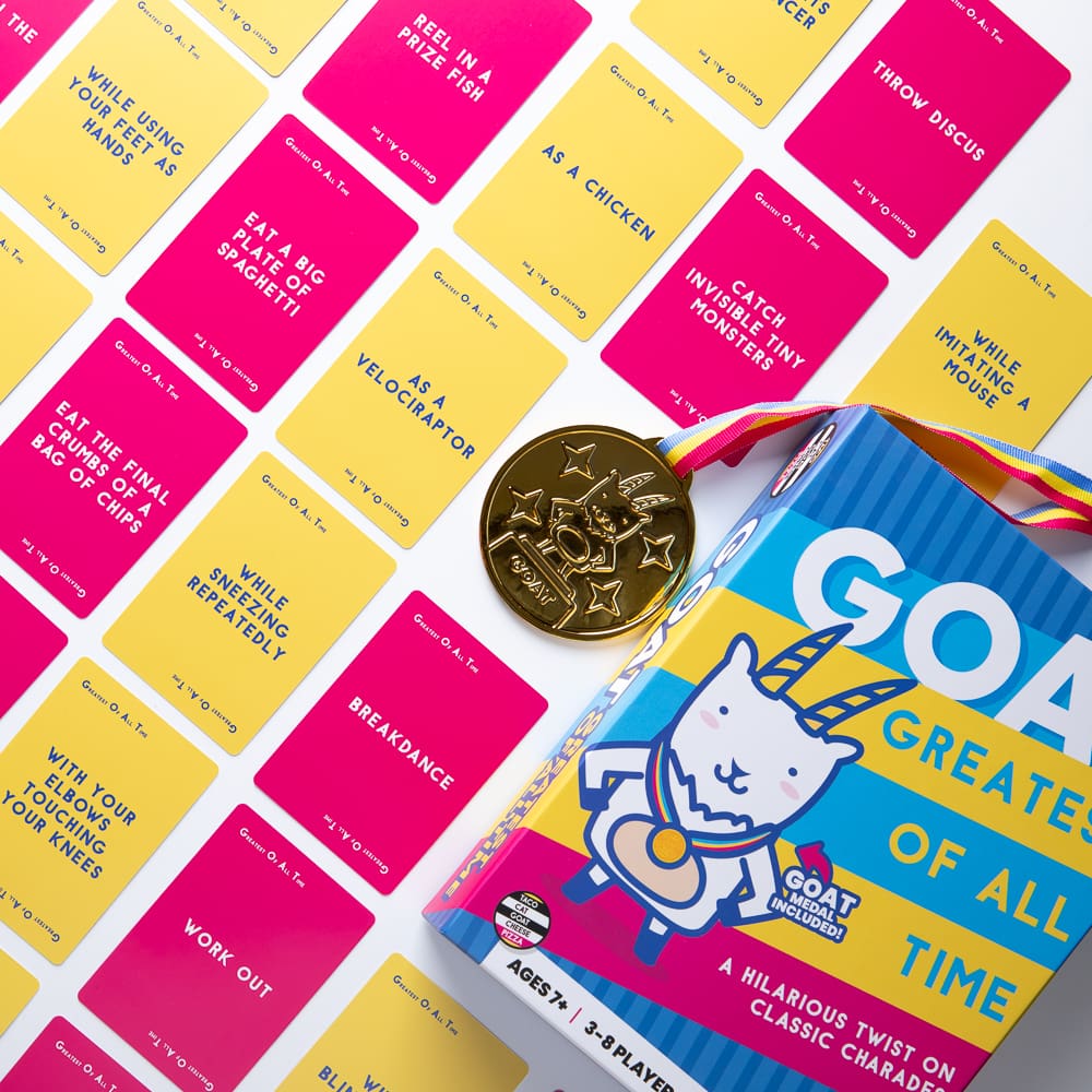GOAT: Greatest of All Time game box with medal and colorful challenge cards