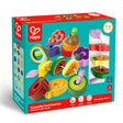 Colorful wooden stacking toy with fruit-shaped pieces and two caterpillar figures designed for toddlers aged 18 to 36 months