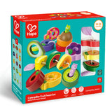 Colorful wooden stacking toy with fruit-shaped pieces and two caterpillar figures designed for toddlers aged 18 to 36 months