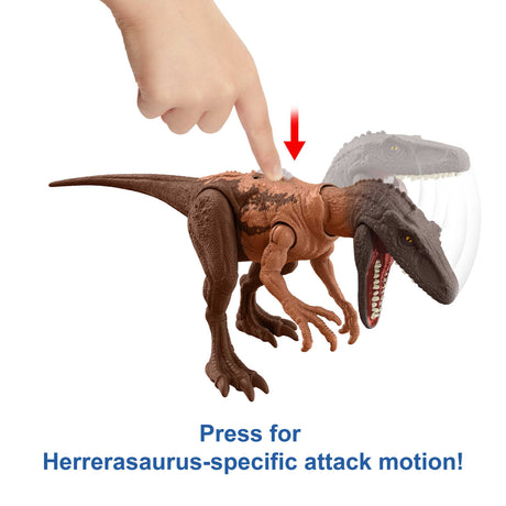 Jurassic World Strike Attack Dino showing Herrerasaurus attack motion feature being pressed on dinosaur toy.