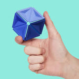 Speks. Pivot. Blue geometric fidget toy held in one hand