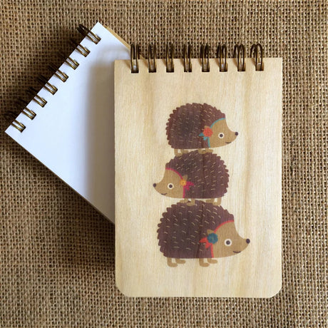 Mini Wood Notebook | Stacked Hedgehogs with eco-friendly birch wooden cover and blank recyclable pages.