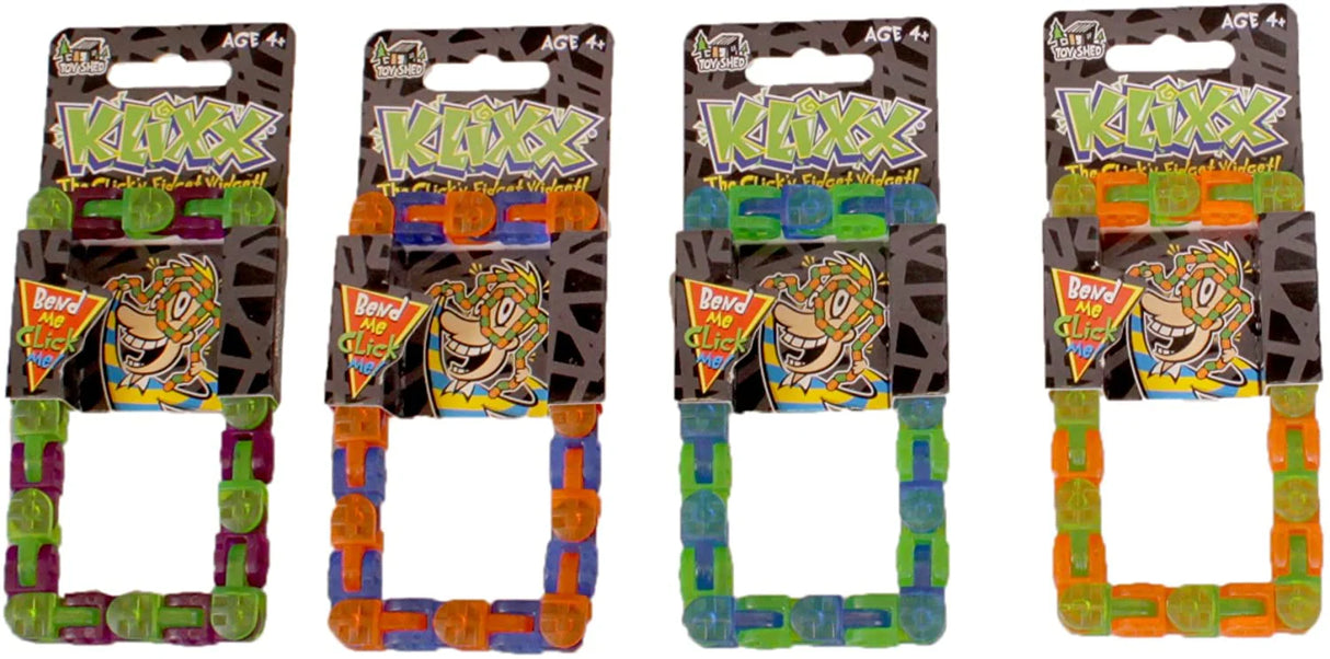 Four different colored Klixx Shortz fidget toys in packaging displayed side by side on white background