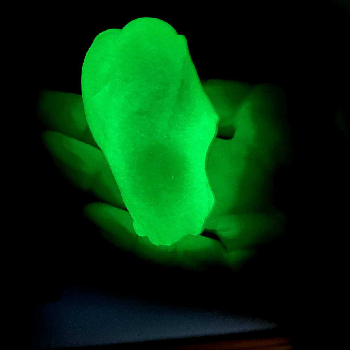 Gootonium: Glowing Brilliant Green Putty glowing brightly in hands