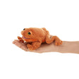 Orange Toad Finger Puppet displayed on a hand