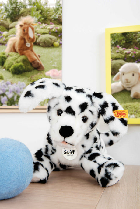 Dalmation Puppy Lupi plush toy with black spots, soft fur, and signature Button in Ear trademark tag.