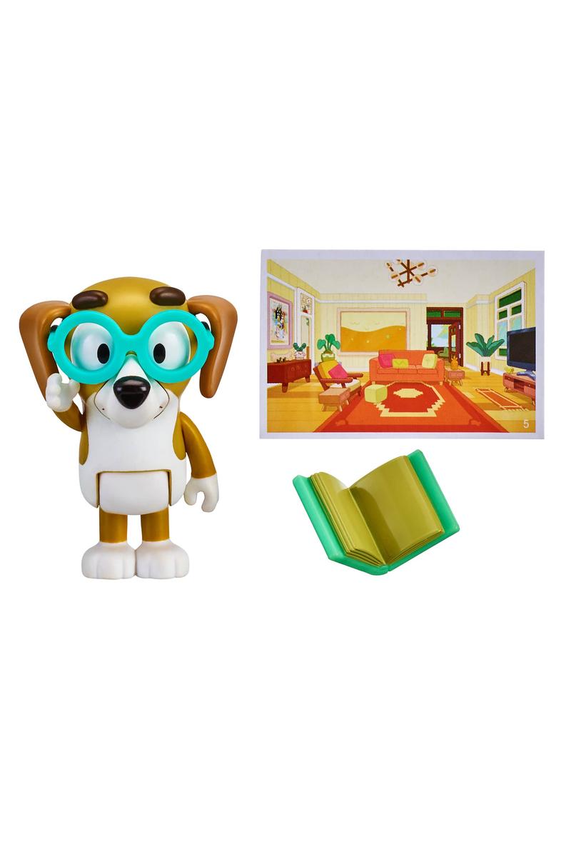 Bluey Story Starter Figure Pack Series 9 featuring a dog figure with glasses, accessory, and postcard scene from the show.