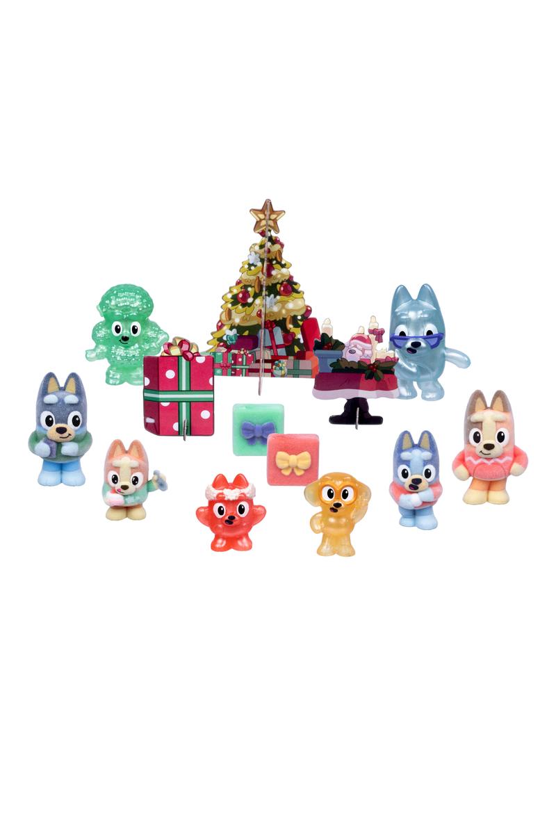Bluey Fuzzies Advent Calendar featuring colorful Bluey characters, a Christmas tree, wrapped gifts, and festive accessories
