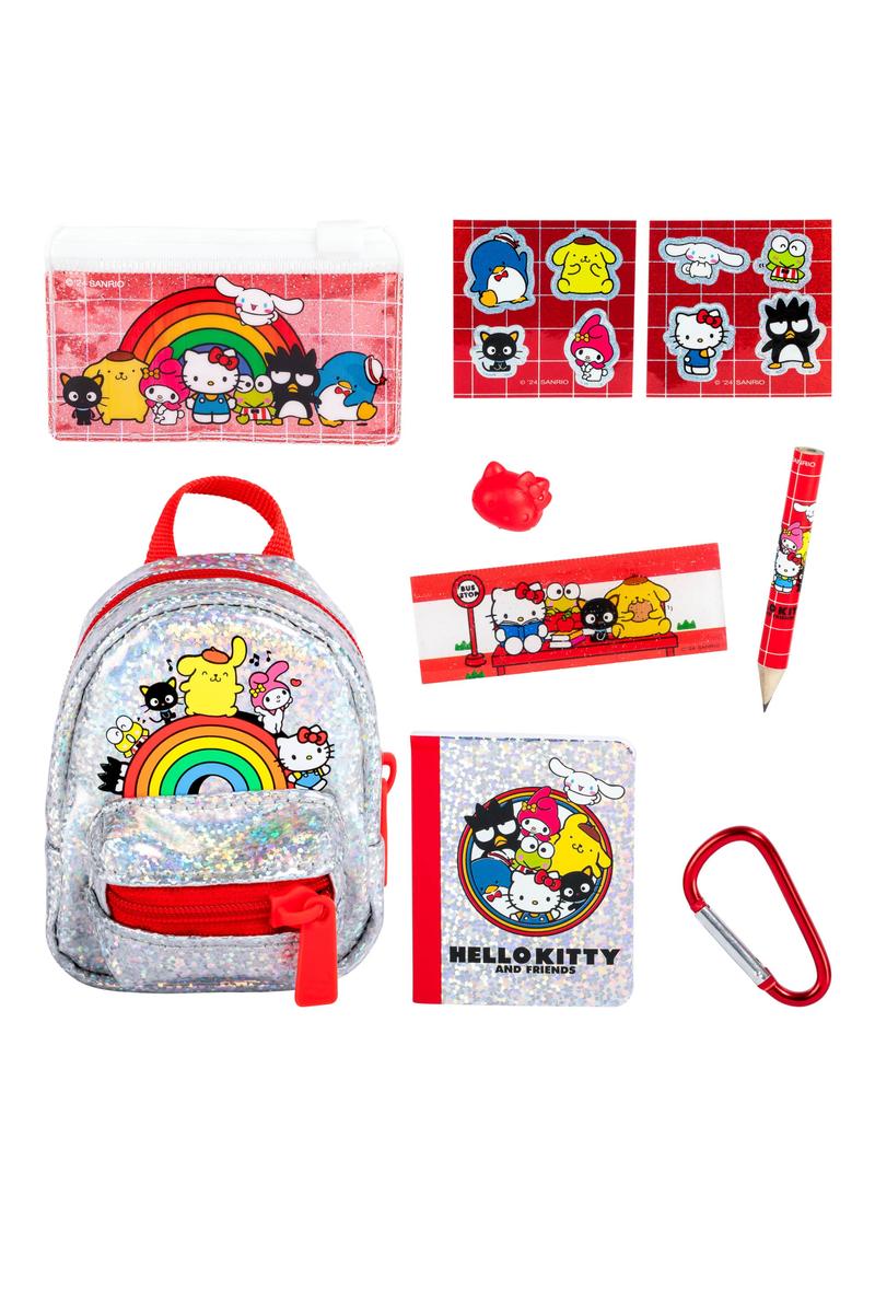 Real Little Hello Kitty Backpack with glitter finish, rainbow design, stickers, pencil, eraser, and mini notebook.