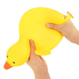 The Big Squij Duck yellow squishy toy held in hands