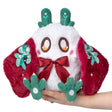 Plush white figure with large expressive eyes, red patterned wings, green leafy antlers, and a red bow on chest