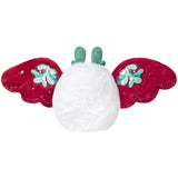 Plush white figure with red felt wings decorated with green mistletoe embroidery and fuzzy green antlers viewed from back
