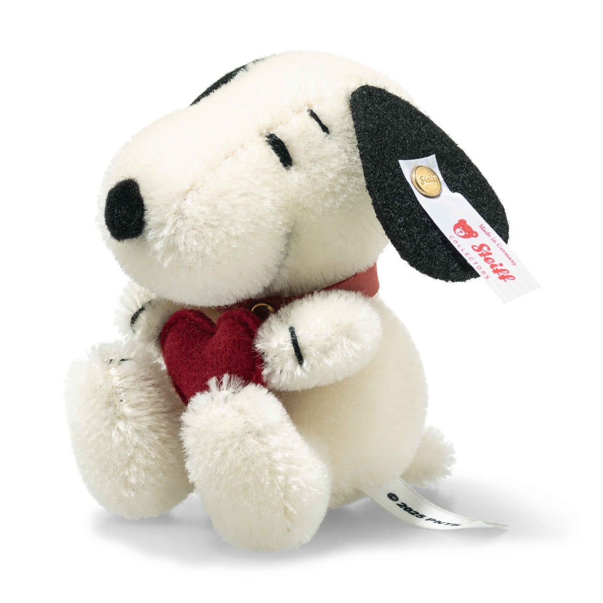 Snoopy Miniature plush by Steiff holding a red heart, handcrafted mohair collectible, 4-inch tall beagle figure.