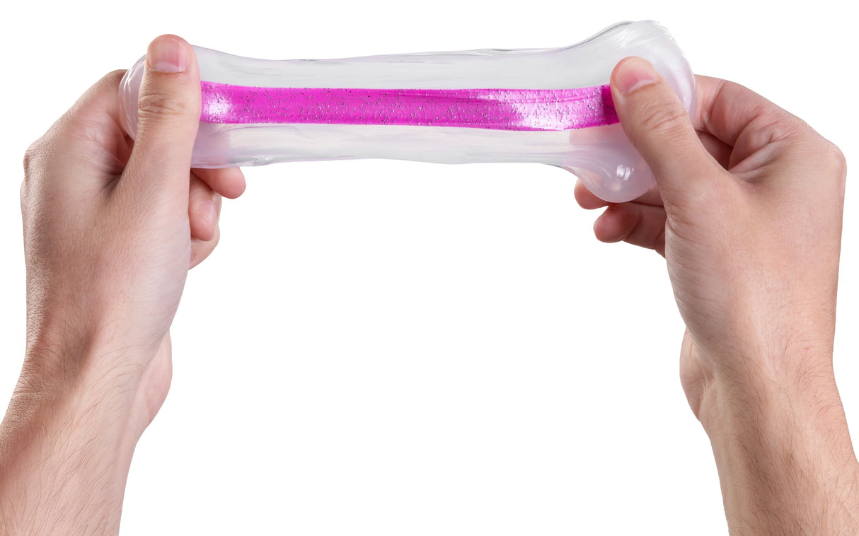 Two hands stretching translucent clear slime with a shiny pink strip running through its center against a white background