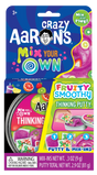 Colorful Fruity Smoothy thinking putty with mix-in packets in vibrant packaging featuring fruit illustrations and play instructions.