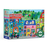 Colorful 20-piece children's puzzle featuring whimsical animal characters in a vibrant village scene with houses and greenery