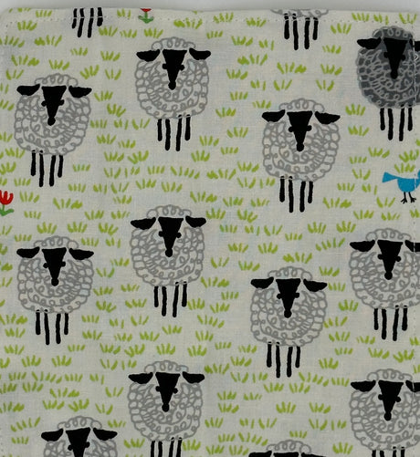 Baby Paper | Organic Sheep features a crinkly organic toy with sheep patterns for baby sensory play.