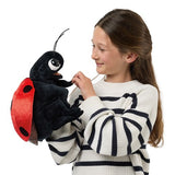 Ladybug Puppet held by a child