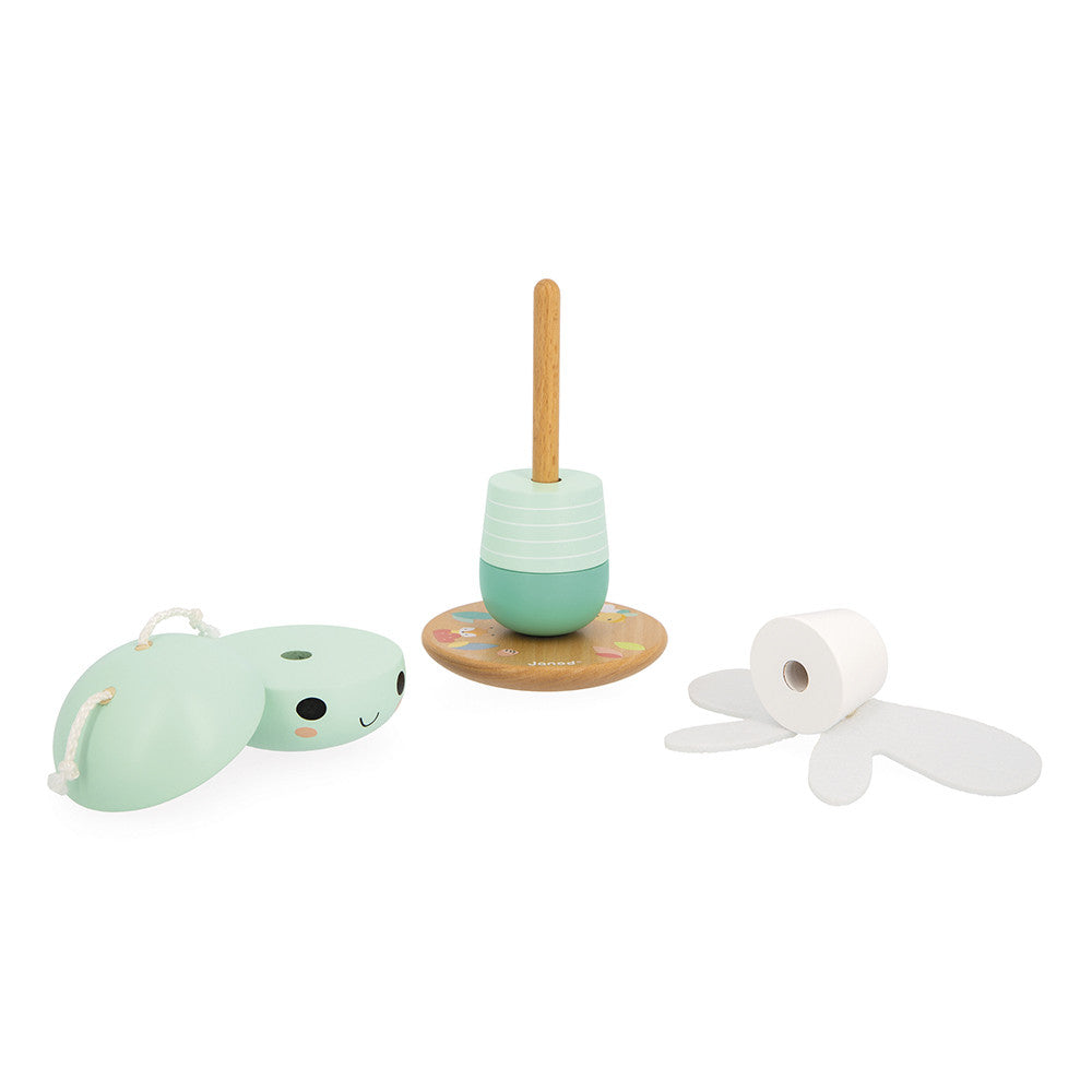 Wooden dragonfly stacker toy with five pastel pieces on a round base designed for toddlers to develop motor skills