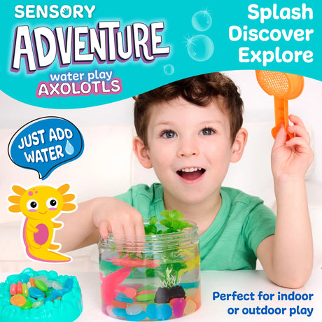 Young boy playing with sensory water play axolotls, colorful stones, and plants in a clear bucket for hands-on fun.