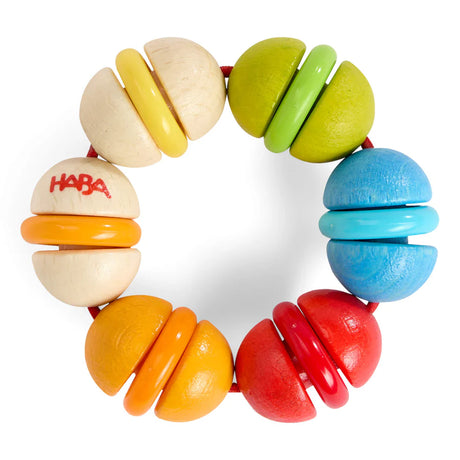 Colorful wooden rainbow rattle with six plastic rings, designed for baby grasping and teething development.