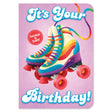 Pair of colorful retro roller skates with rainbow stripes and red wheels on purple birthday card background