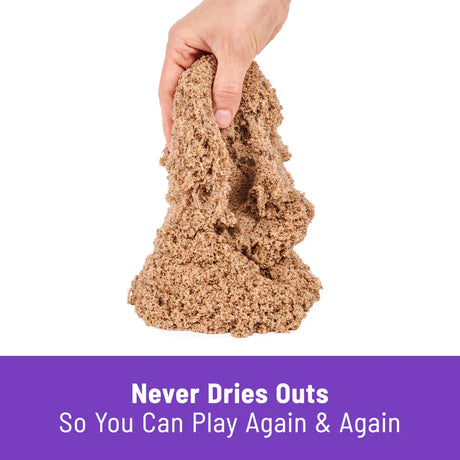 Hand holding kinetic sand flowing like wet beach sand that never dries out | Kinetic Sand | 3lb Beach Sand