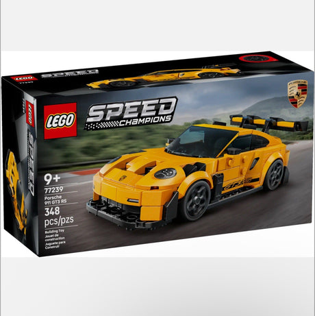 Speed Porsche 911 GT3 RS Super Car LEGO set with detailed rear wing, headlights, and driver minifigure in racing outfit.