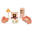 Miniature doll house sitting room set with sofa, armchair, fireplace, bookcase, coffee table, lamp, and knit blanket