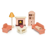 Miniature doll house sitting room set with sofa, armchair, fireplace, bookcase, coffee table, lamp, and knit blanket