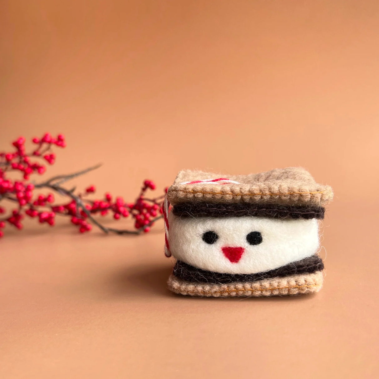 Smiling S'more Felt Ornament with happy marshmallow between wool graham crackers and chocolate, handmade from Nepal.