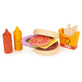 Wooden play food set with stackable burger pieces, fries, and squeeze bottles for imaginative take-out play.