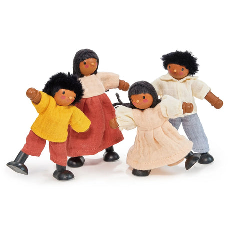 Set of four wooden dolls dressed in colorful soft fabric clothing posing playfully on white background
