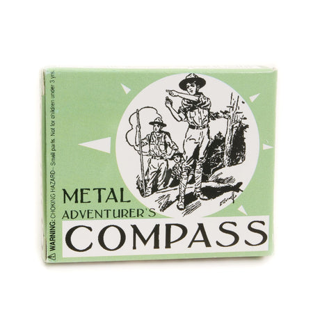 Metal Compass product packaging with vintage explorer illustration on a green background for Junior Adventurer’s kit.