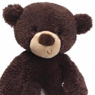 Teddy Bear Fuzzy Chocolate plush with floppy arms, round ears, fuzzy chocolate fabric, and a cute sideways smile for cuddling.